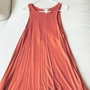 Orange sleeveless dress with pockets